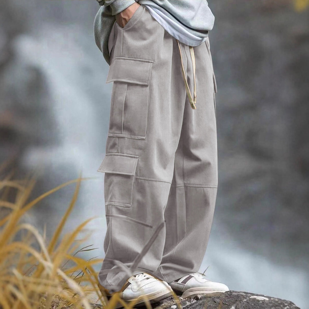 Men's casually cut multiple pockets cargo pants with wide leg and prominent knee darts Mune Fashion