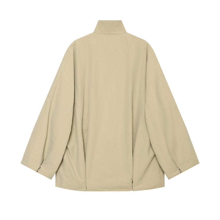 Women's short water-repellent cape coat with stand-up collar and snap button closure Mune Fashion