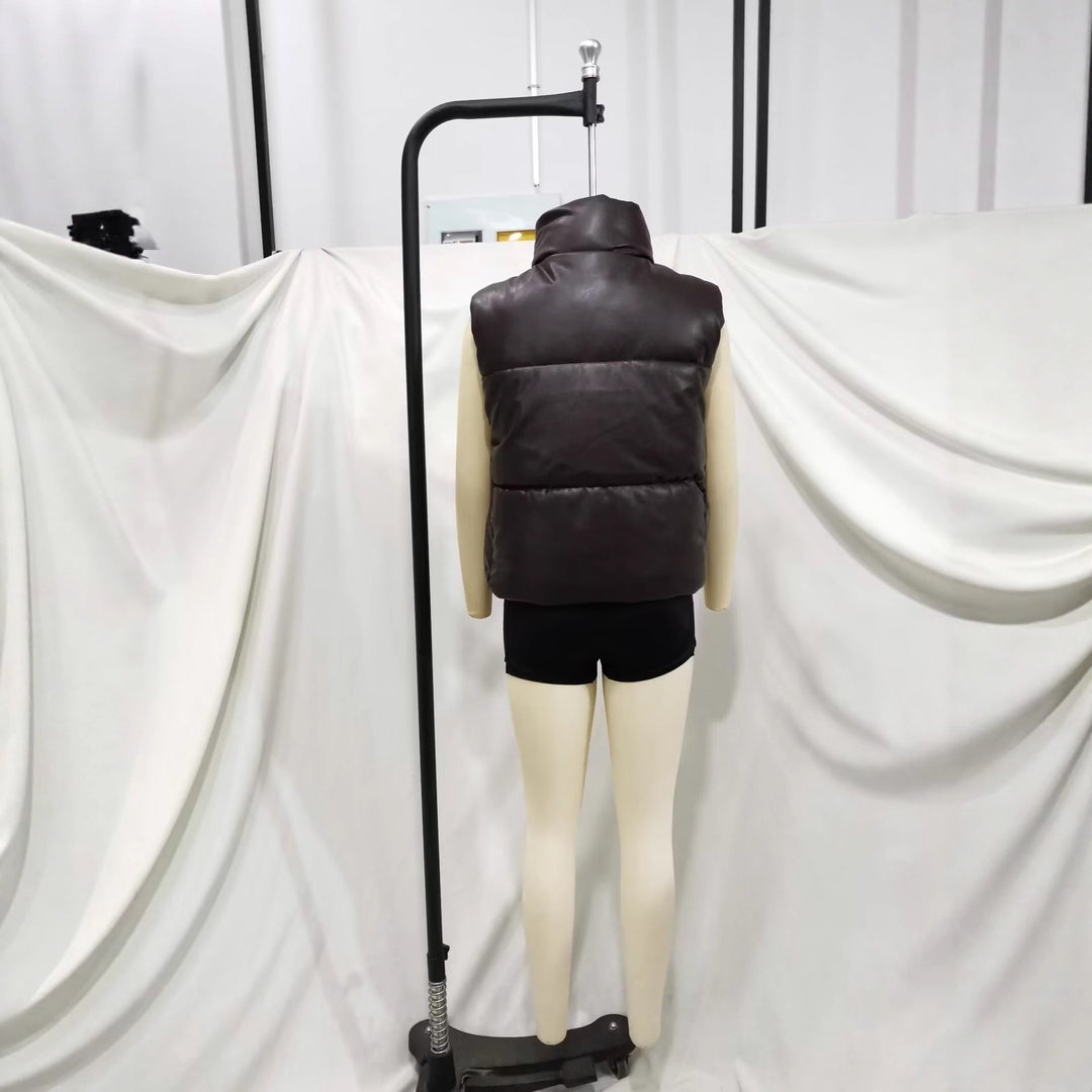 Ladies nan padded faux leather vest with high stand-up collar, snap button placket and waist drawstring Mune Fashion