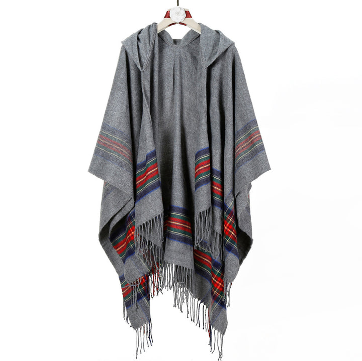 Women's hooded cape poncho in tartan pattern with fringed hem made of soft wool blend Mune Fashion
