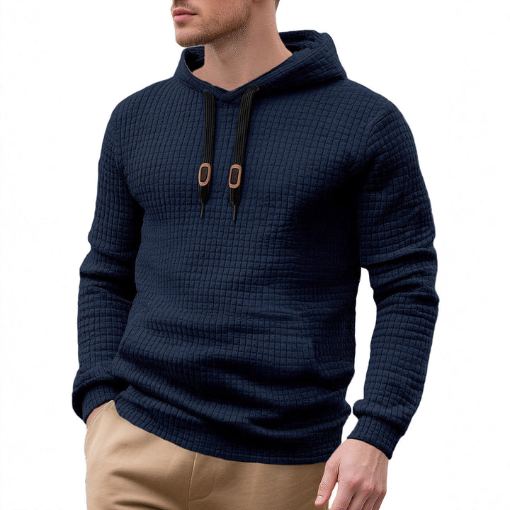 Men's narrow-cut quilted hoodie with fine square texture, drawstring and ribbed hem Mune Fashion