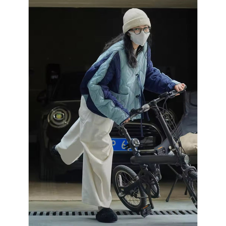 Women's Padded Oversized Quilted Jacket with Contrasting Sleeves and Button Placket Mune Fashion