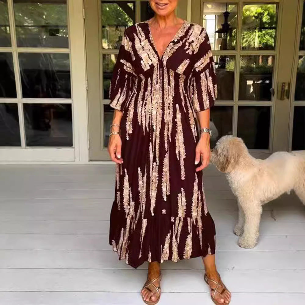 Women's maxi dress with V-neck, vertical brush print, gathered underbust seam and tiered ruffle skirt Mune Fashion