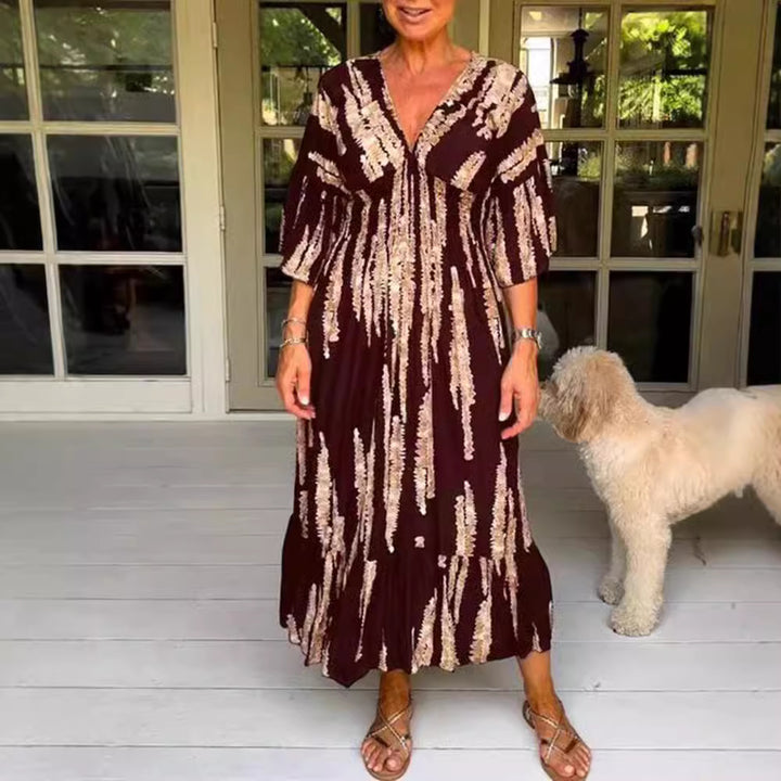 Women's maxi dress with V-neck, vertical brush print, gathered underbust seam and tiered ruffle skirt Mune Fashion
