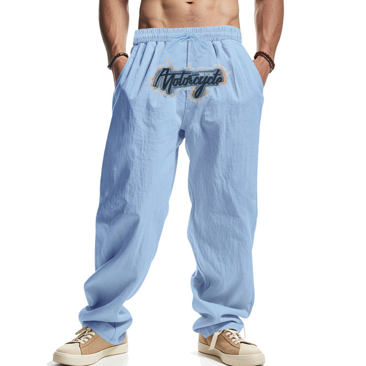 Men's loosely fitting linen look relax pants with elastic waistband, drawstring & front print Mune Fashion