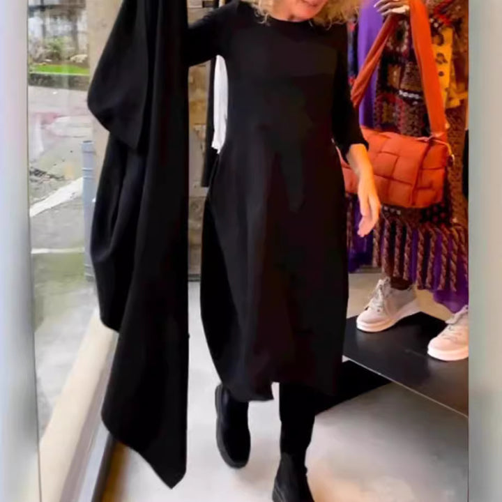 Women's asymmetrical balloon dress with three-quarter sleeves, side pockets, and flowing pointed hem Mune Fashion
