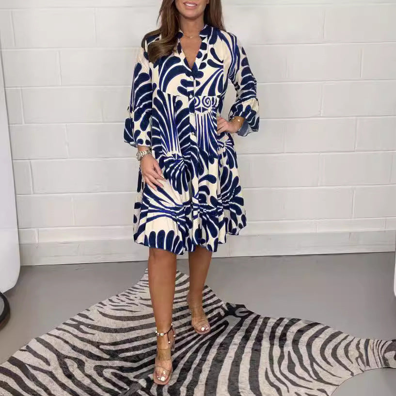 Women's tiered dress with large leaf print, V-neck and three-quarter sleeves Mune Fashion