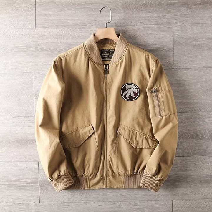 Men's Casual Bomber Jacket with Zipper, Chest Patch and Sleeve Pocket Detail Mune Fashion