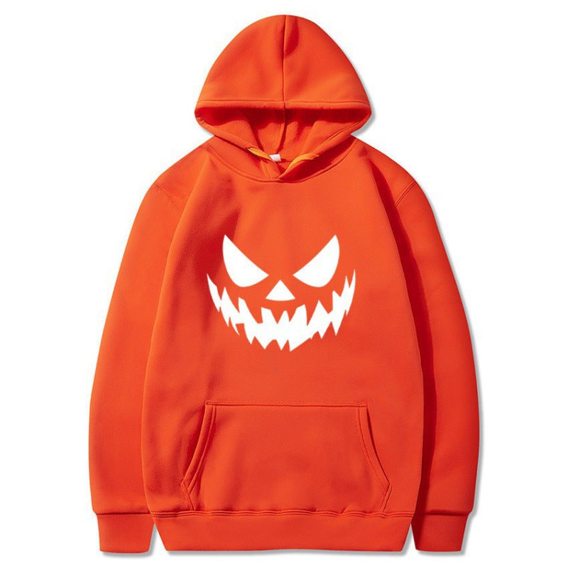 Unisex hooded sweatshirt with creepy pumpkin face print and oversized kangaroo pocket Mune Fashion