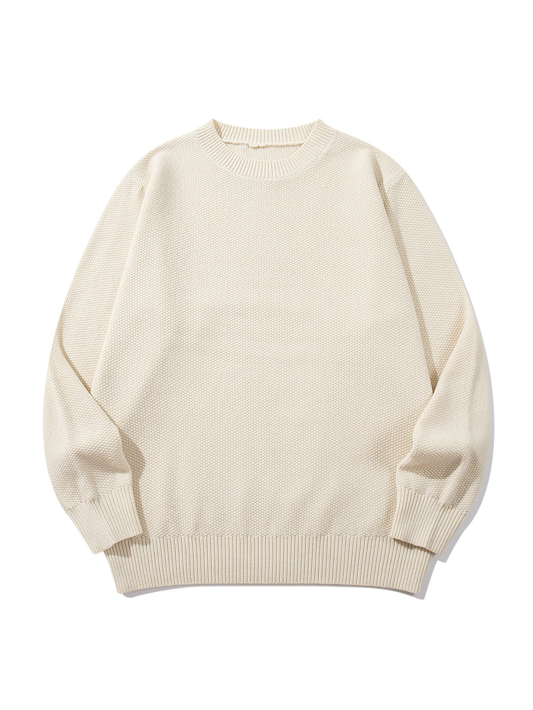 Unisex chunky knit round neck sweater with textured purl stitch and ribbed cuffs
