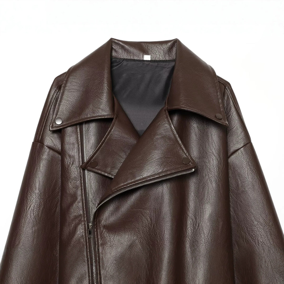 Women's oversized biker jacket made of synthetic leather with a fitted belt and asymmetrical zipper Mune Fashion