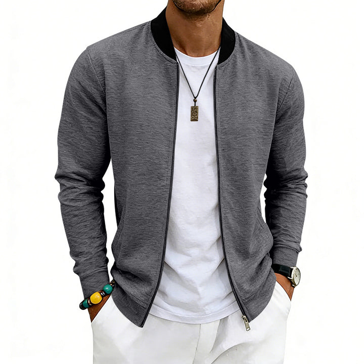 Men's lightweight bomber jacket made of jersey with stand-up collar, elastic cuffs, and concealed pockets Mune Fashion