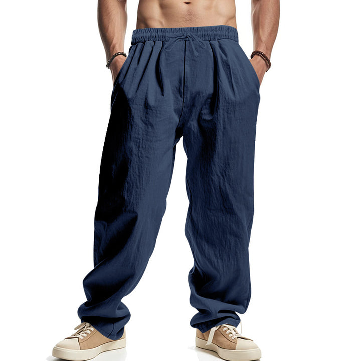 Men's loose leisure pants with elastic waistband, drawstring, and deep side pockets Mune Fashion