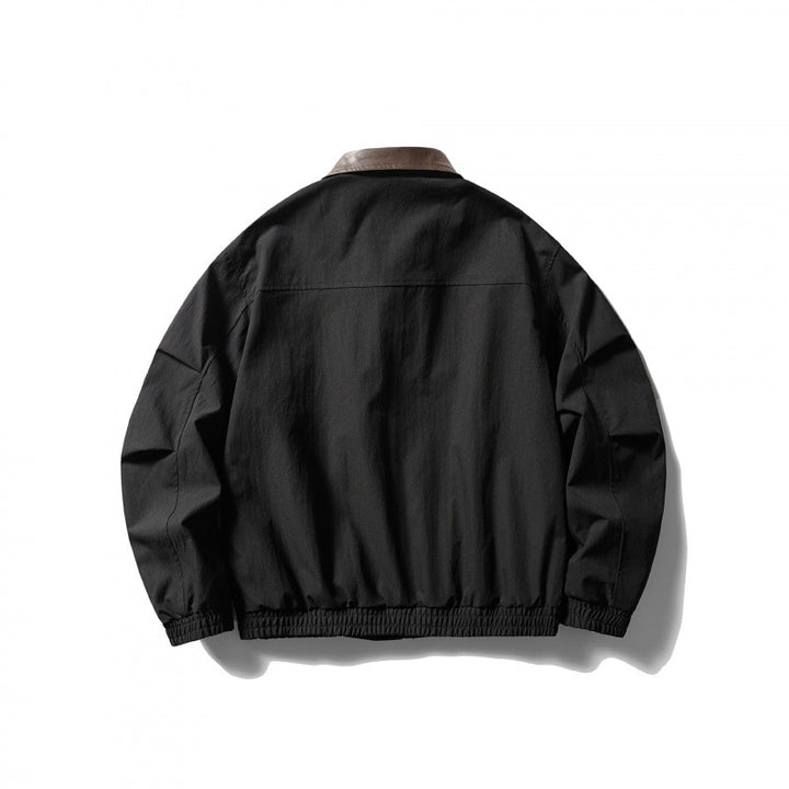 Men's loose-fitting zip jacket with contrast collar made of faux leather and elastic hem Mune Fashion