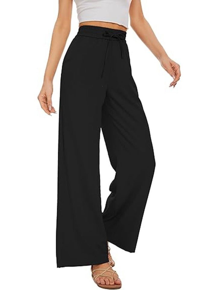 Women's wide linen pants with high elastic waistband, drawstring, and side pockets Mune Fashion