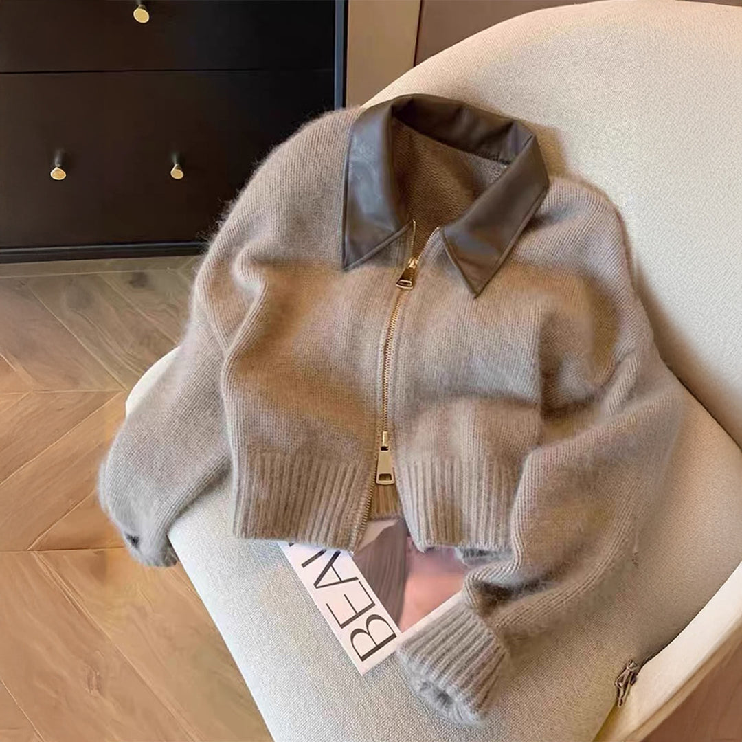Women's short-cut knitted blouse with faux leather collar and gold-colored metal zipper Mune Fashion