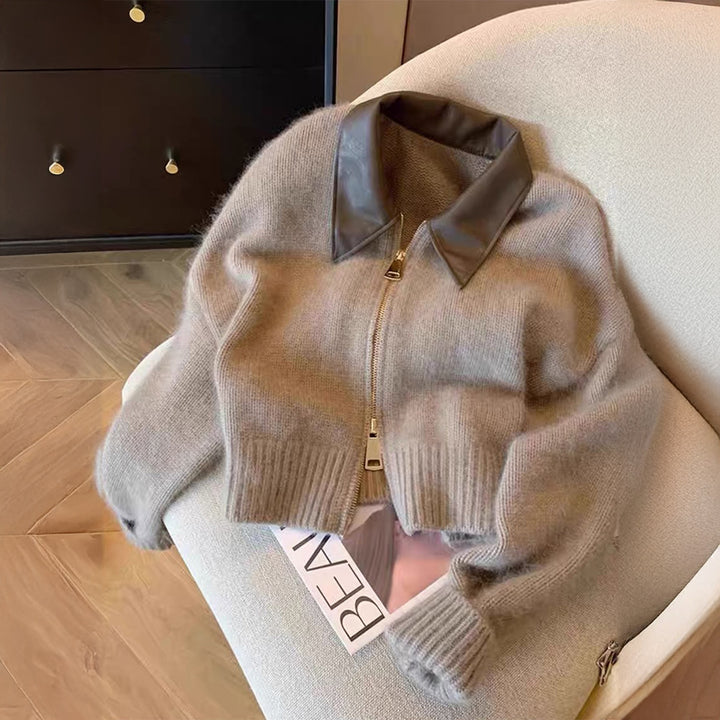 Women's short-cut knitted blouse with faux leather collar and gold-colored metal zipper Mune Fashion