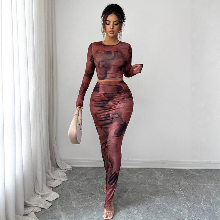 Women's two-piece fitted set made of elastic mesh with long-sleeved crop top, thumbhole, and ruched midi skirt Mune Fashion