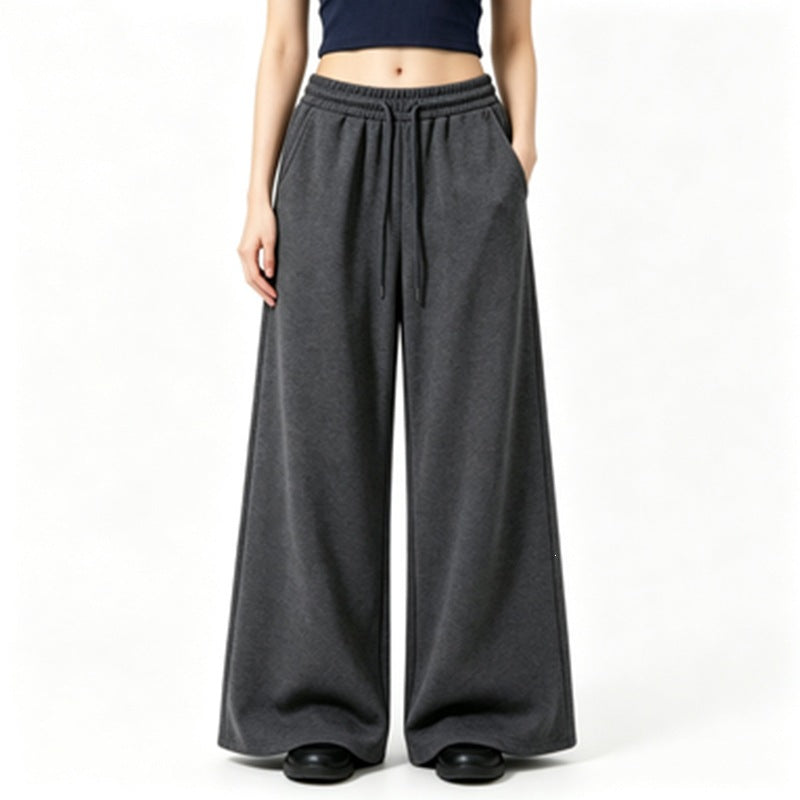 Ladies wide high-waist lounge pants with elastic waistband, drawstring, and flowing jersey Mune Fashion