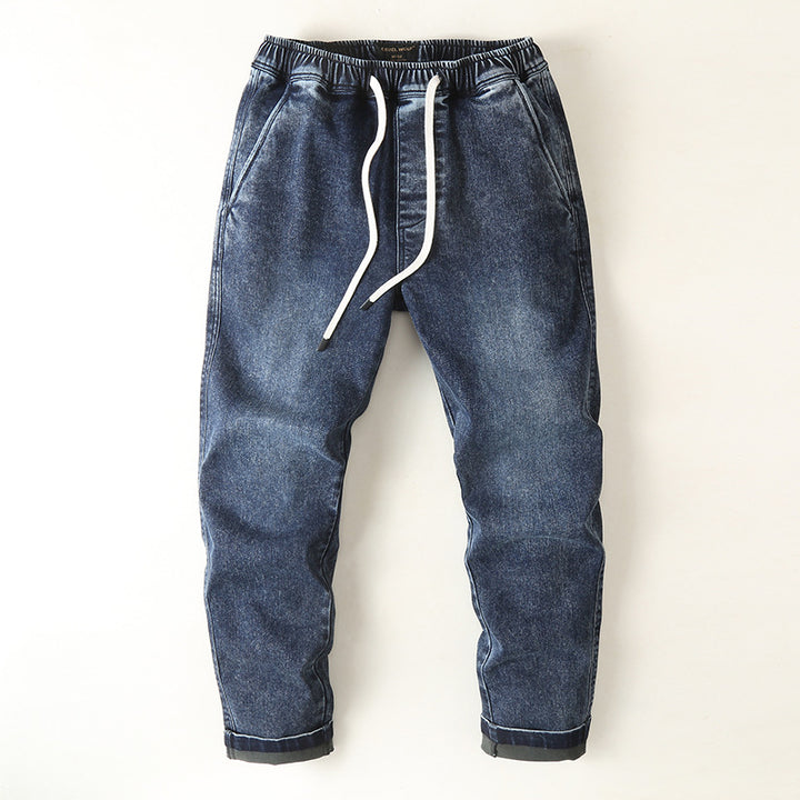 Men's denim joggers with elastic waistband, drawstring, and rolled hem Mune Fashion