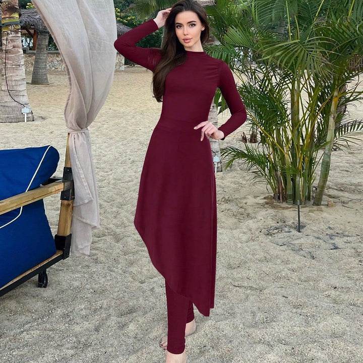 Ladies elegant beach suit with asymmetrical cut and long sleeves Mune Fashion
