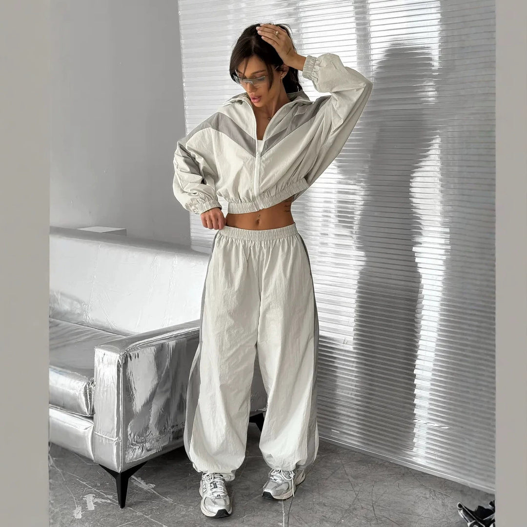 Women's satin track set with stand-up collar, chevron stripes and drawstring Mune Fashion