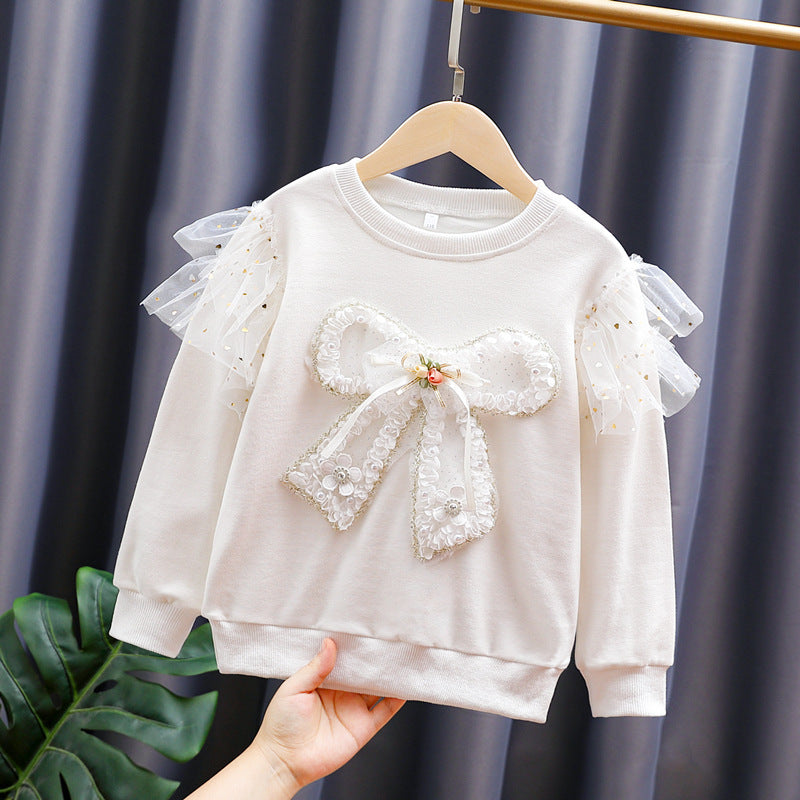 Girls fashion sweatshirt with transparent puff sleeves and bow detail Mune Fashion