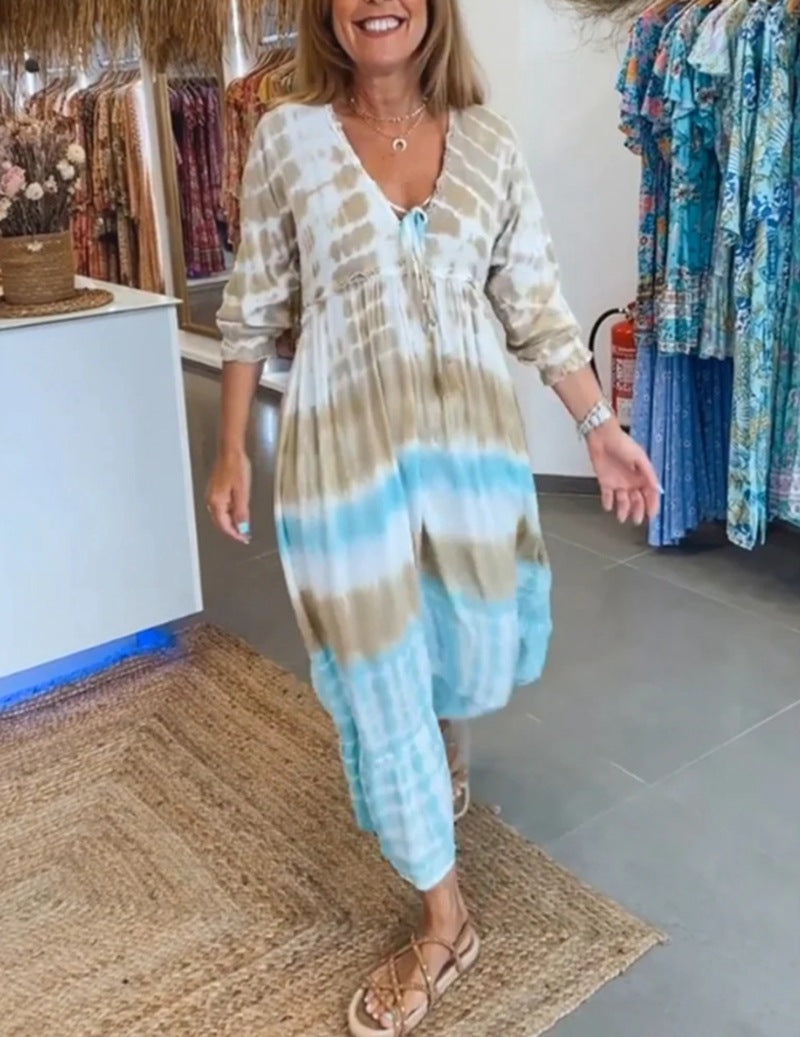 Women's airy batik tiered dress with V-neck, empire waist, and elastic sleeves Mune Fashion