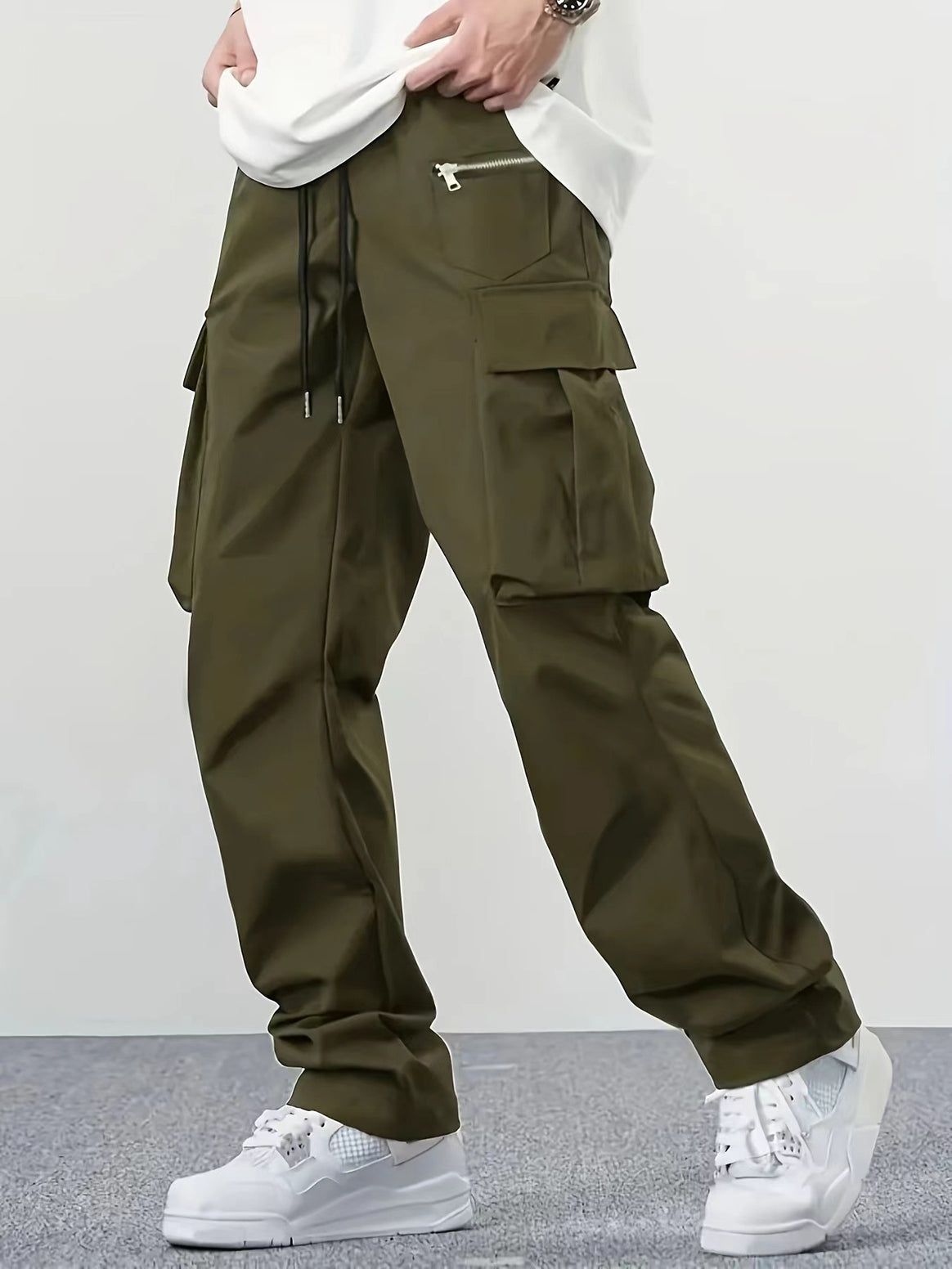 Men's wide technical cargo pants with large flap and zip pockets and drawstring waistband Mune Fashion