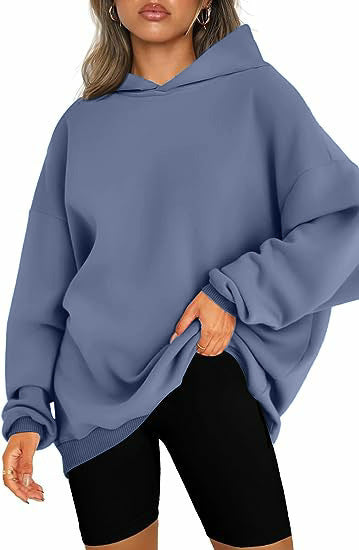 Women's oversized hoodie in longline cut with raglan sleeves and soft inner lining Mune Fashion