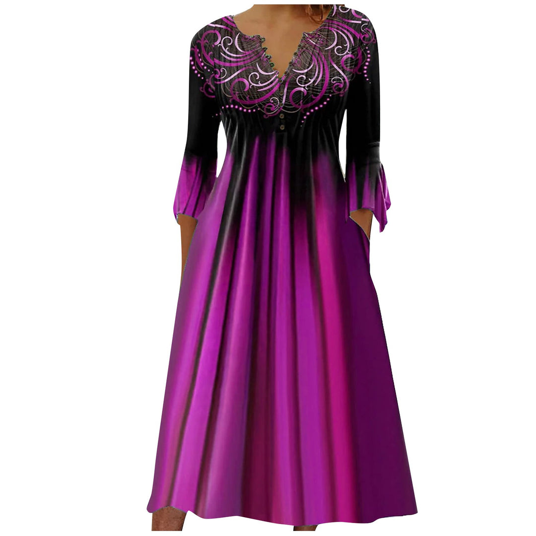 Women's flowing maxi dress with embellished V-neck, underbust seam, flared skirt and side pockets Mune Fashion