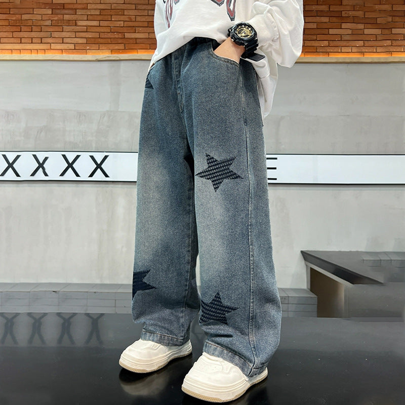 Unisex wide jeans pants with star appliqués Mune Fashion