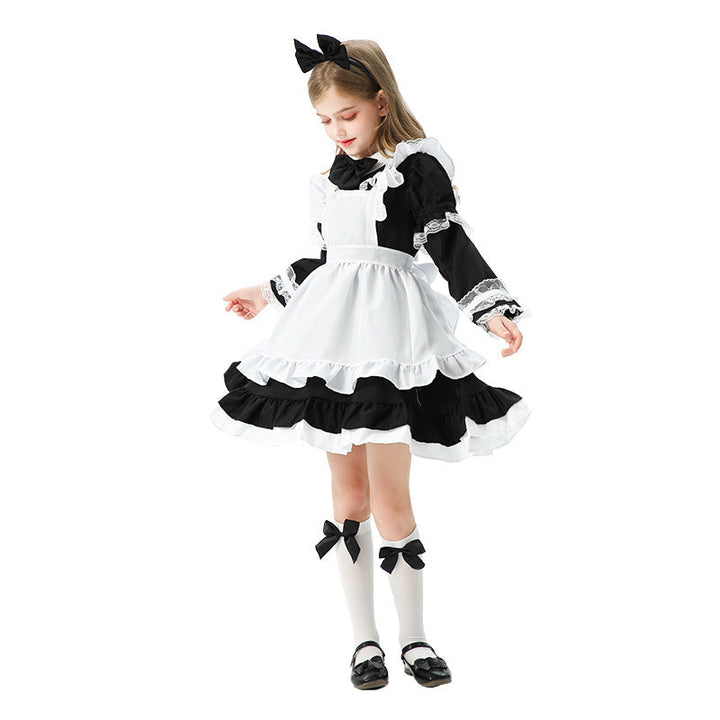 Girl's playful maid dress with ruffle details Mune Fashion