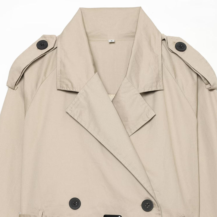 Women's short blouson trench coat with double-breasted button placket, shoulder epaulets, and waist belt Mune Fashion