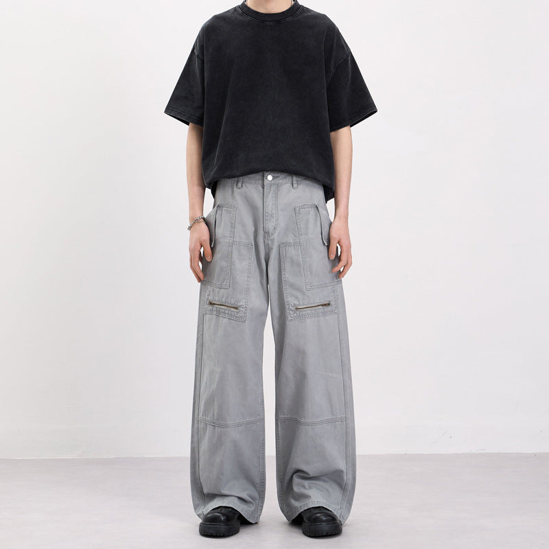 Men's baggy cargo pants in workwear style with large patch pockets and zipper details Mune Fashion