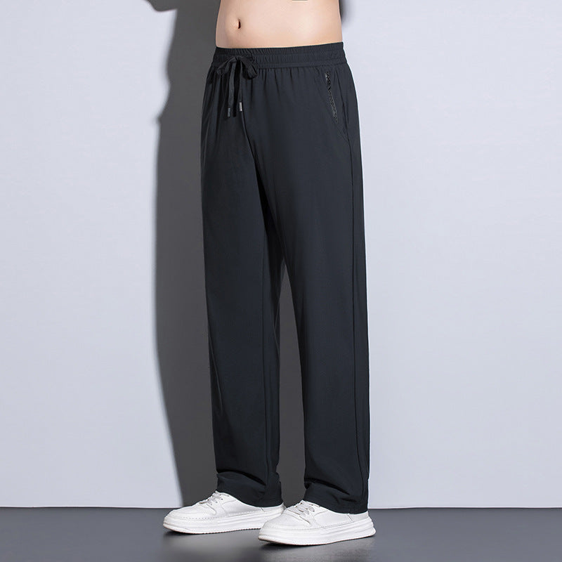 Men's sporty training pants with elastic waistband and practical pockets Mune Fashion