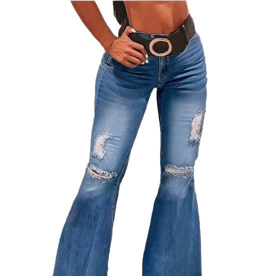Women high-waisted flared trousers made of stretch denim with flared leg, knee rips, and frayed hem Mune Fashion