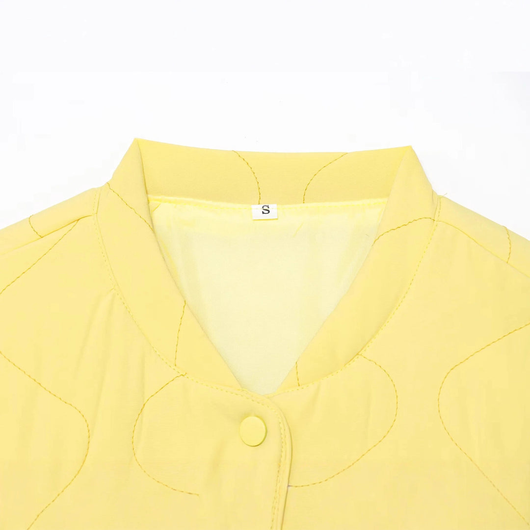 Women's quilted transitional jacket with wave stitching, V-neck and snap button placket Mune Fashion