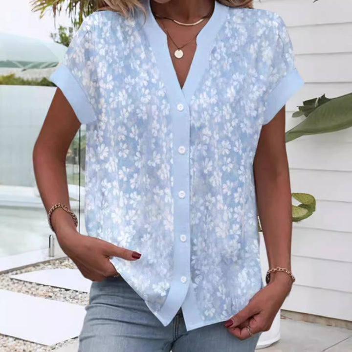 Women's airy button blouse with V-neck, rolled sleeves and floral textured print Mune Fashion