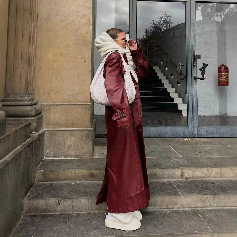 Women 100+ long oversized faux leather trench coat with waist belt and wide lapels Mune Fashion