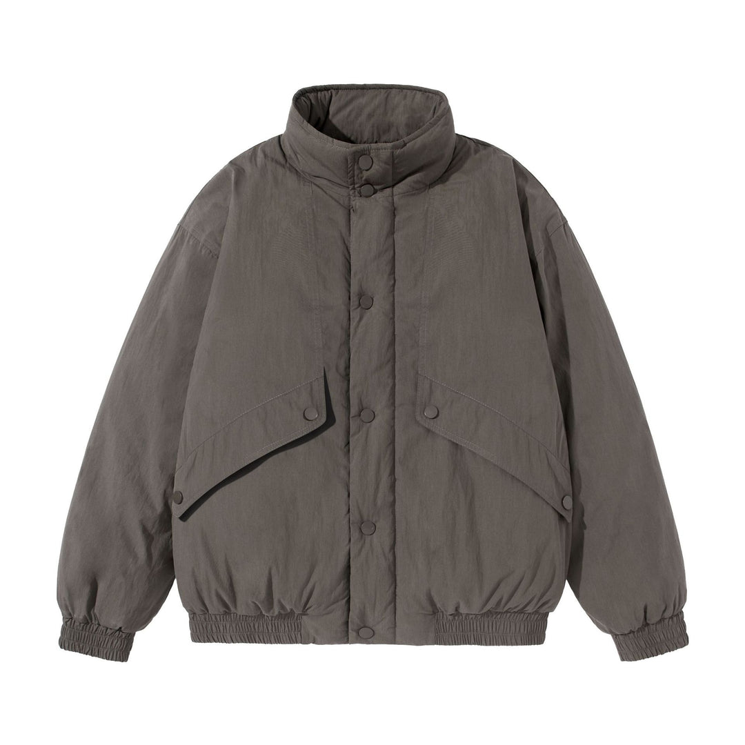 Unisex Short-cut quilted boxy blouson jacket with high stand-up collar and utility flap pockets Mune Fashion