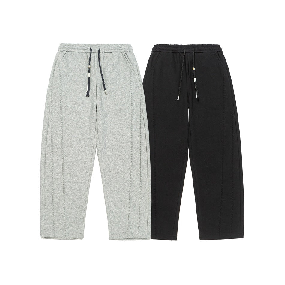 Women's Wide High-Waist Jogging Pants with Decorative Seams and Drawstring Mune Fashion
