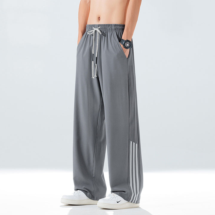Men's sporty leisure pants with side ventilation openings