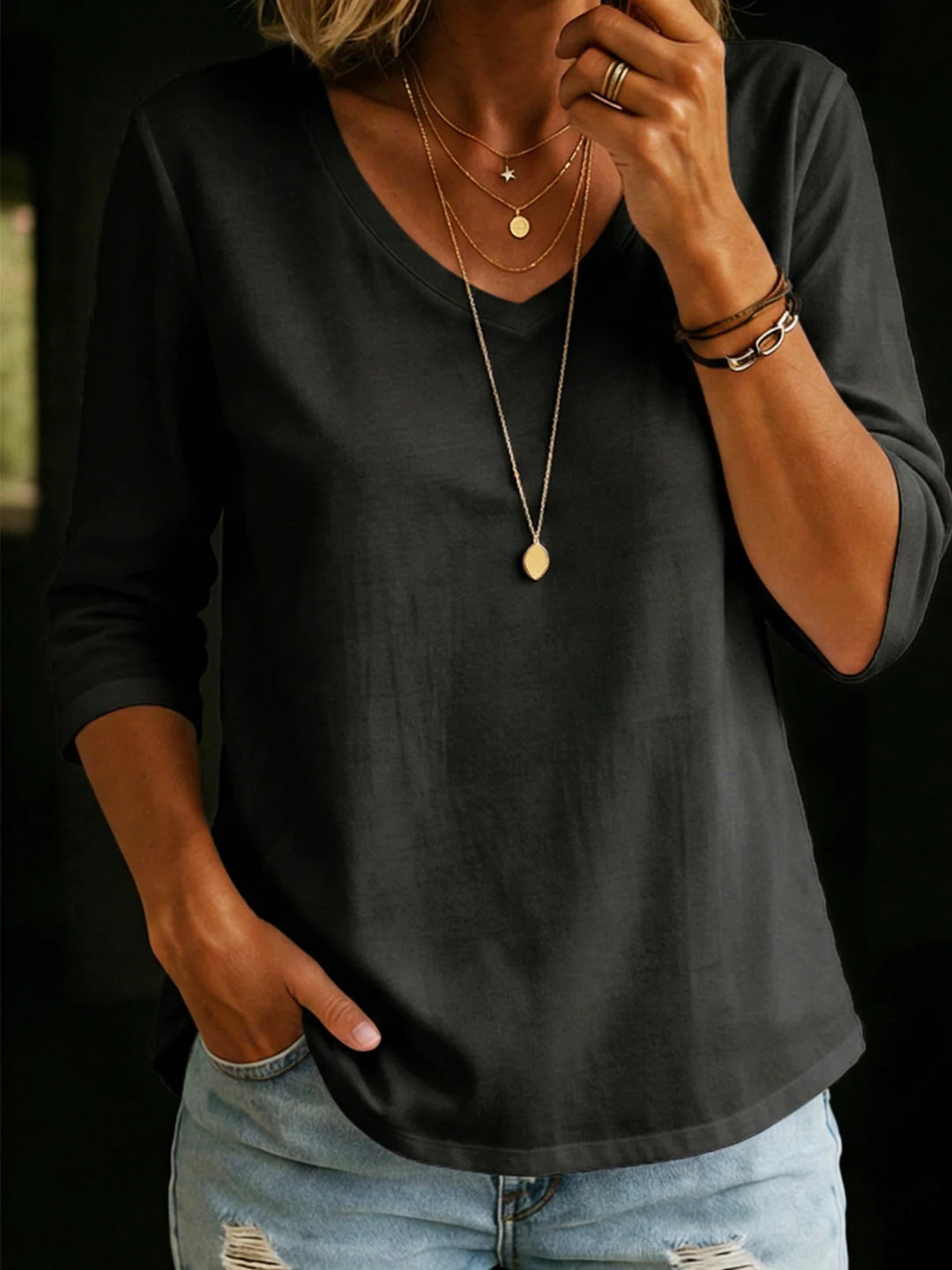 Women's Loose V-Neck Shirt with 3/4 Sleeves and Rounded Hem Mune Fashion