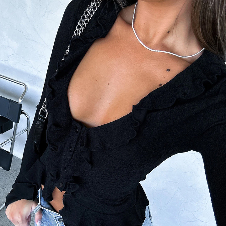 Women’s fitted ruffled fine knit cardigan with tie belt, V-neck and flounce sleeves Mune Fashion