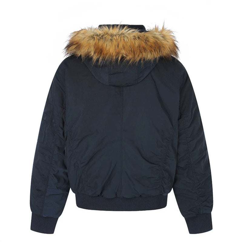 Women's short-cut bomber jacket with faux fur hood and eyelet application Mune Fashion