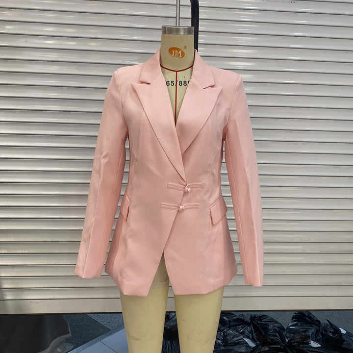 Women's elegant long blazer with decorative knot closures and flap pockets Mune Fashion