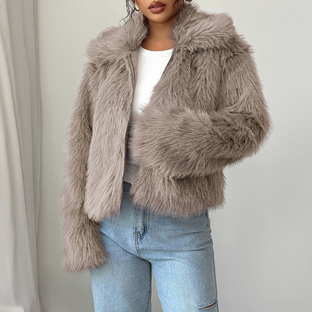 Women's short faux fur jacket with standing collar, concealed zipper and wide sleeves Mune Fashion