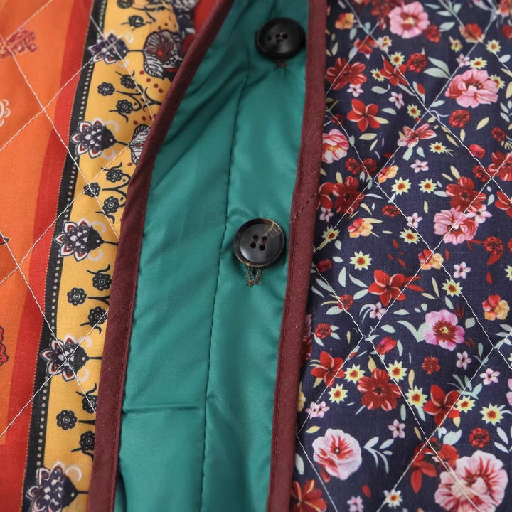 Women nan quilted patchwork jacket with paisley and floral print, round neckline and patch flap pockets Mune Fashion