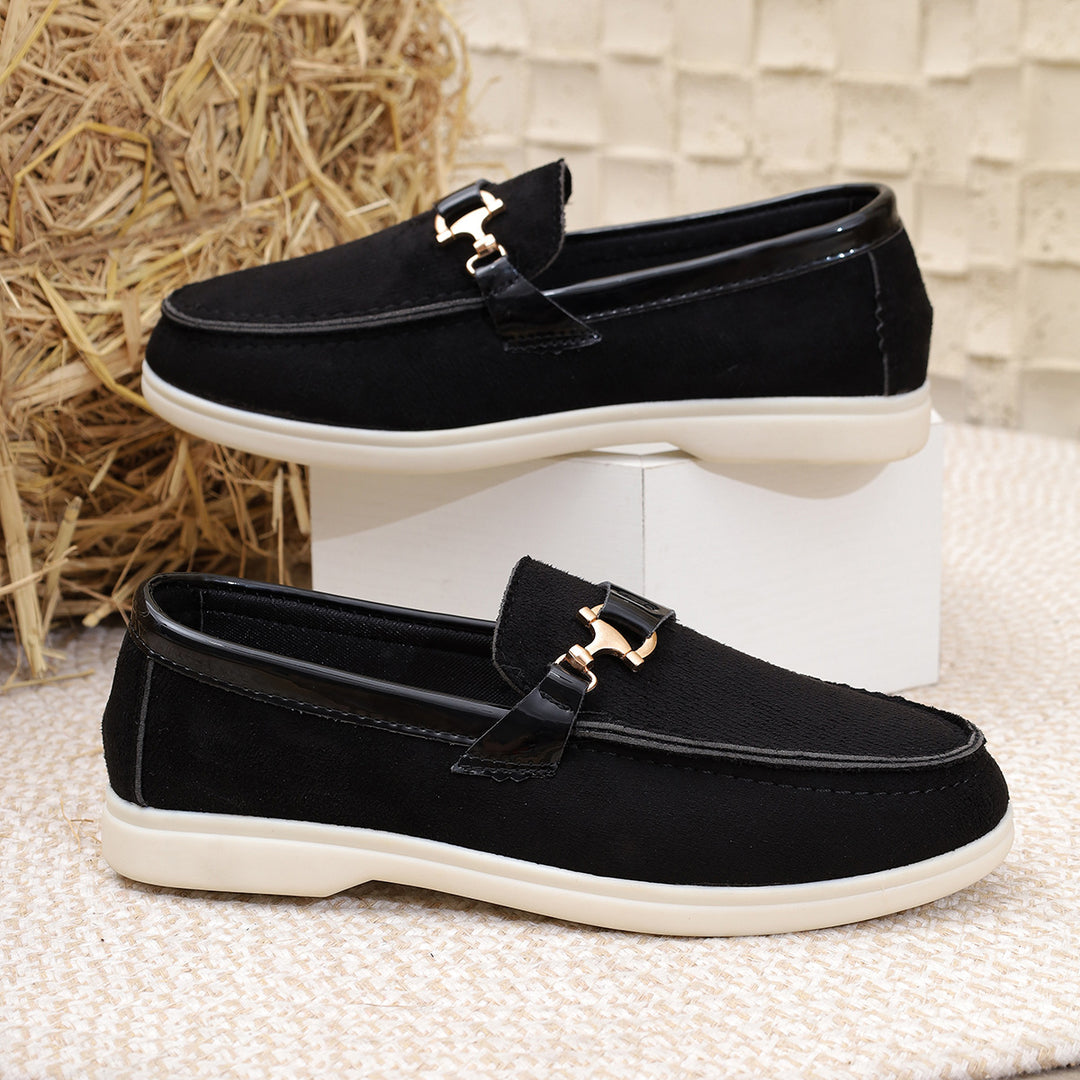 Ladies elegant suede slippers with decorative metal hardware and flexible easy-running sole Mune Fashion